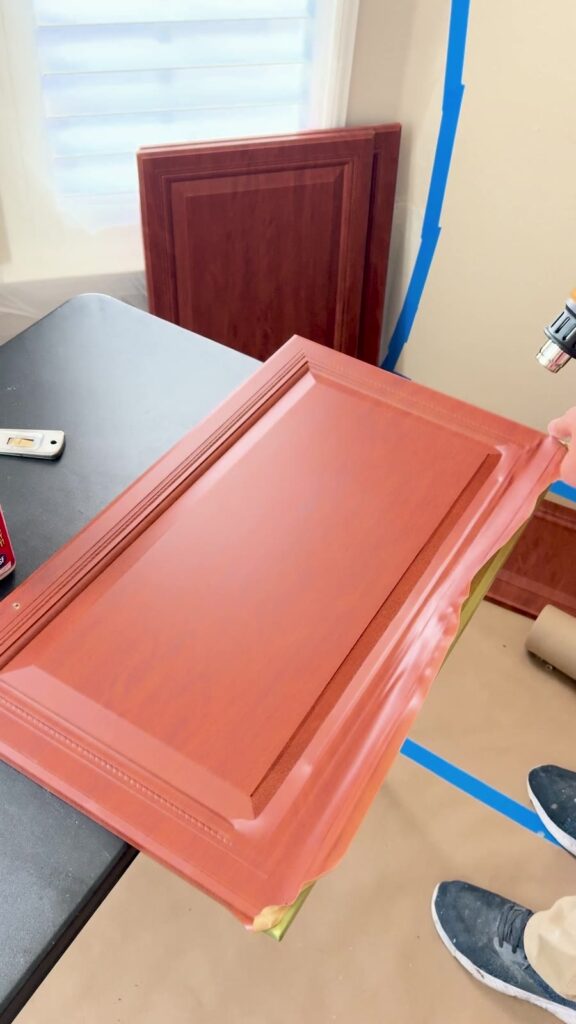 Brown cabinet door in the earliest documented project condition