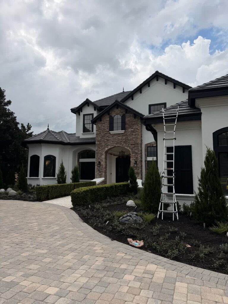 Westchase home front exterior during continued painting work