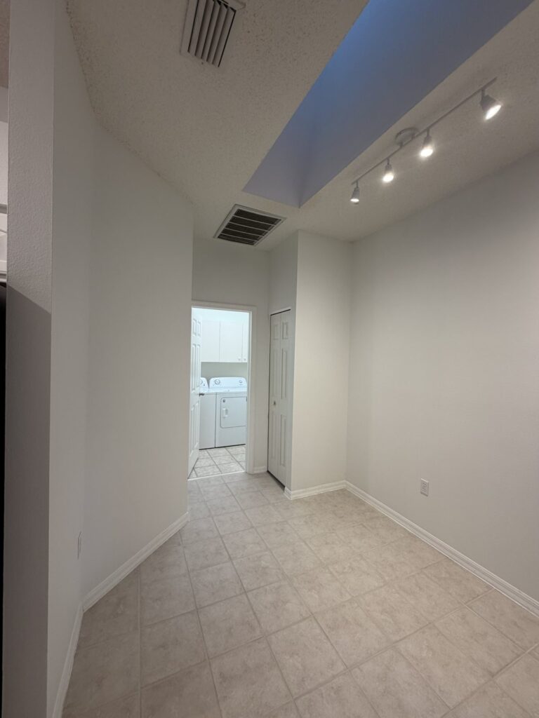 Residential dining and transition area in a later documented condition