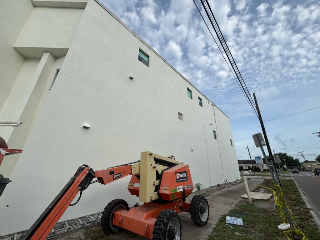 Access equipment positioned at a Tampa commercial exterior