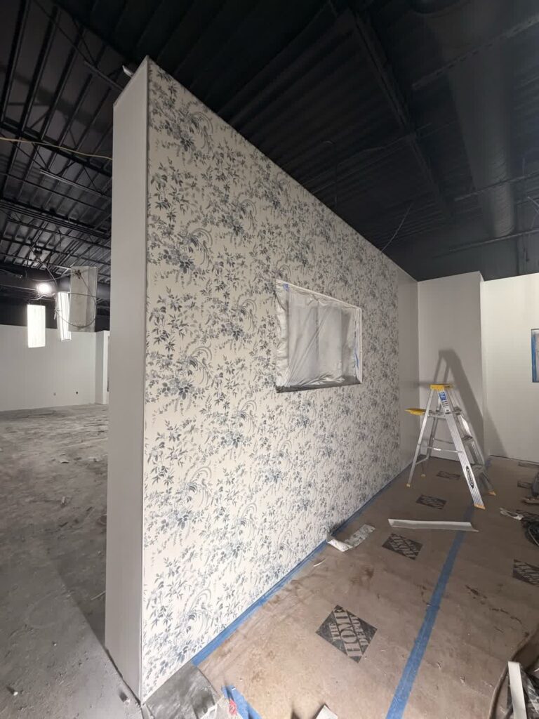 Feature wall during commercial showroom painting work