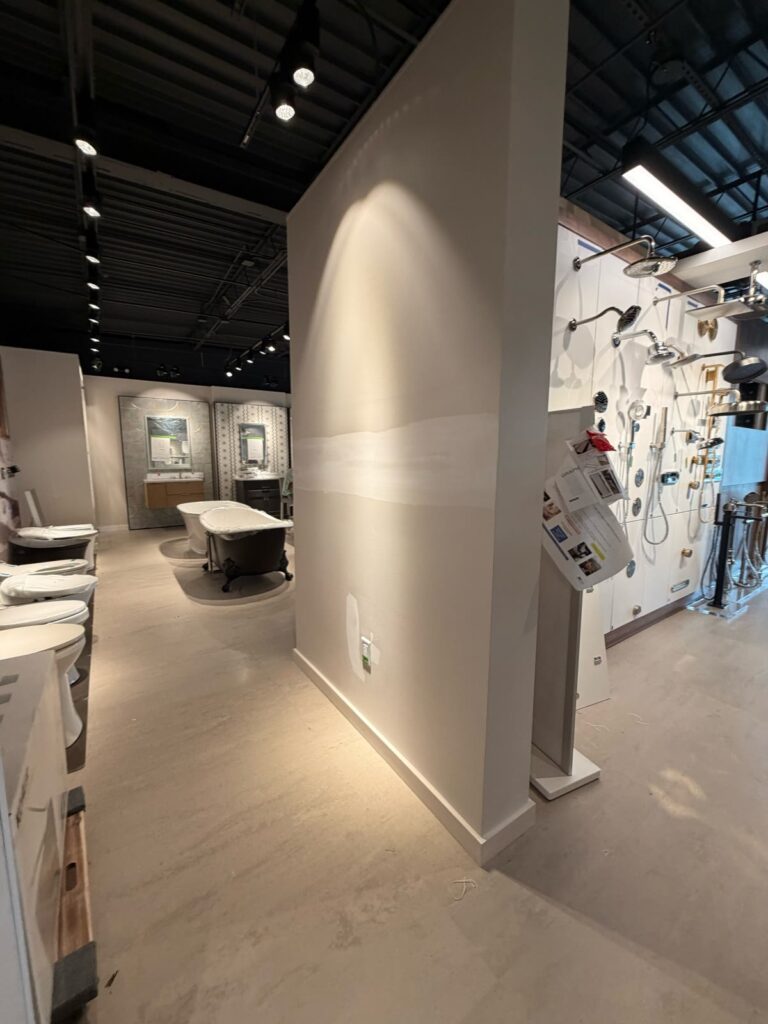 Commercial showroom wall finish during a later project stage