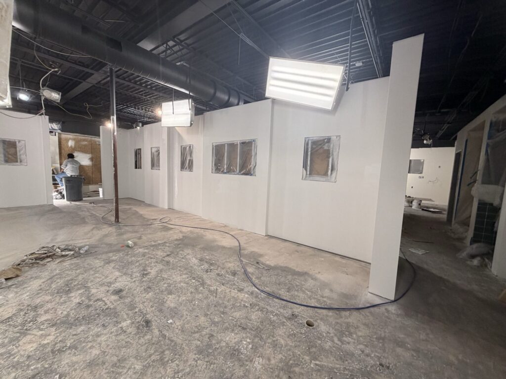 Second view of wall preparation in the Tampa showroom