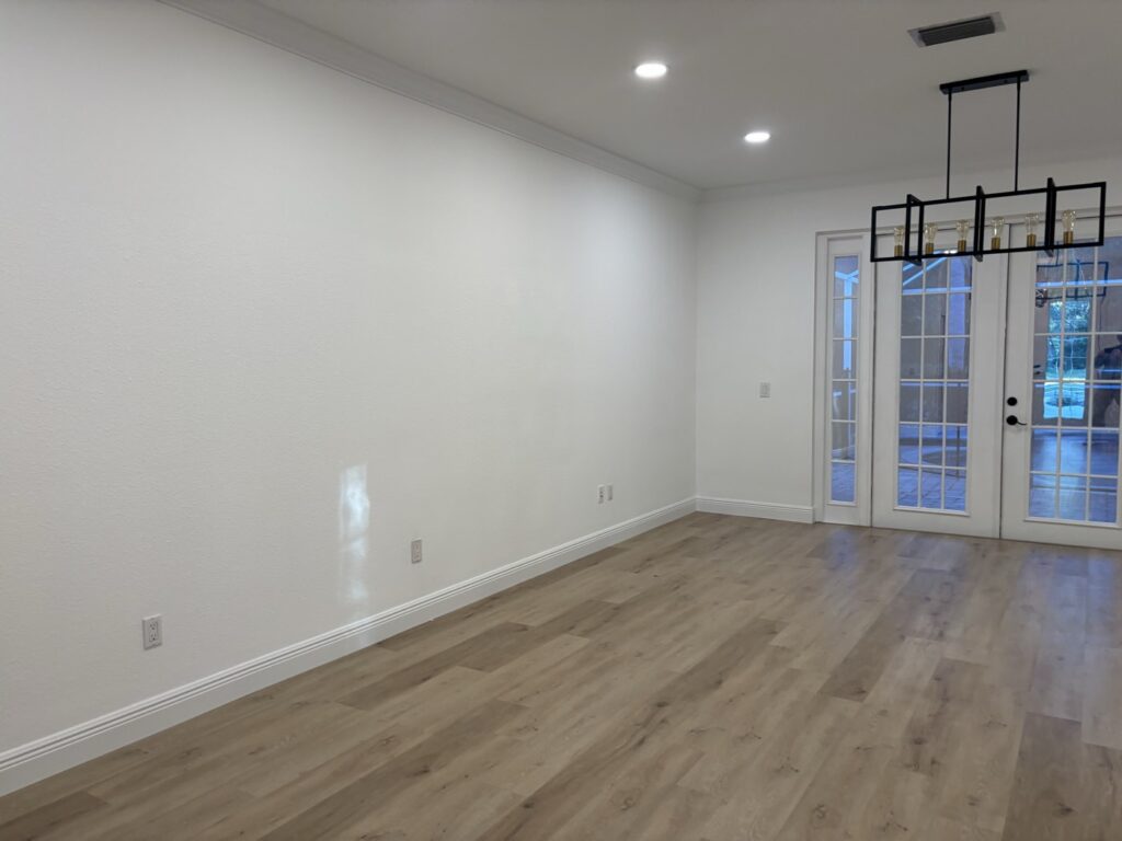 Completed interior room with French doors