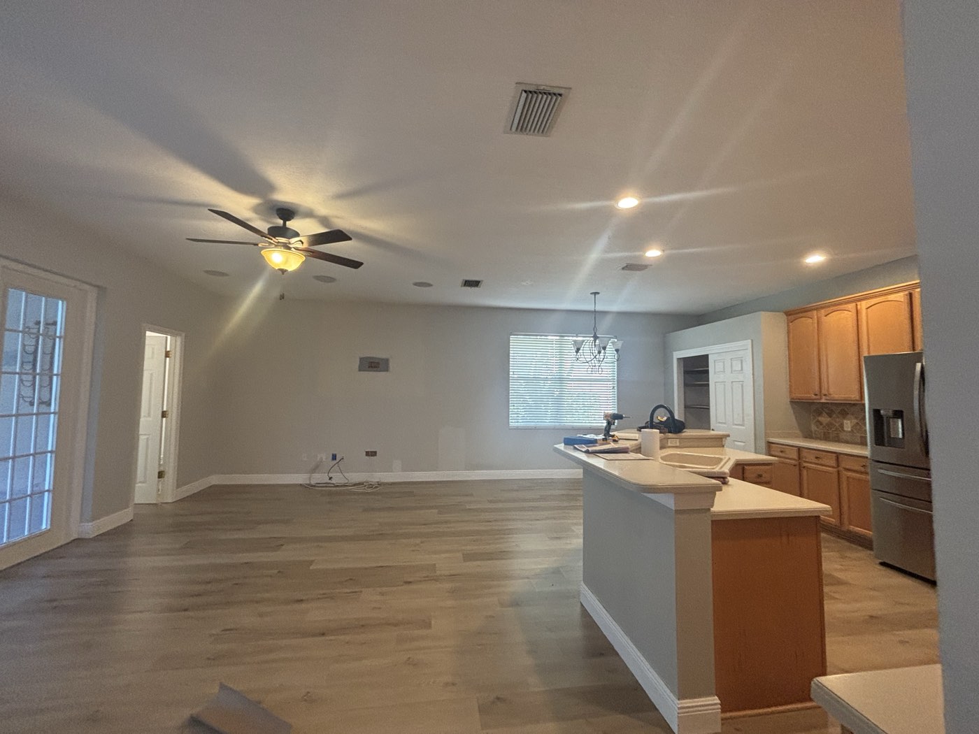 Open living area protected during interior painting